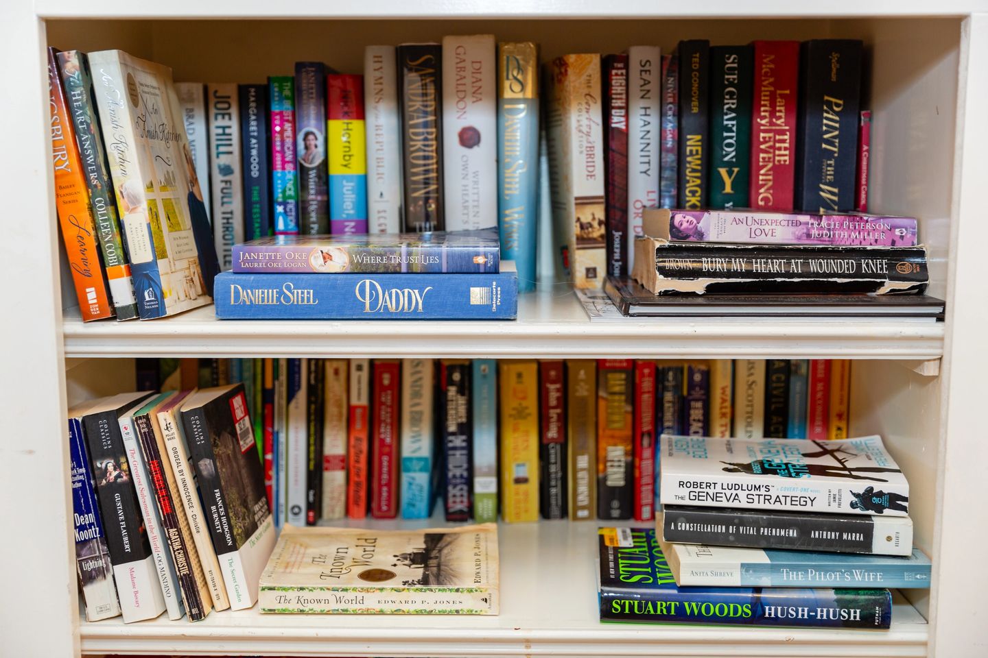 A bookshelf with many books on it